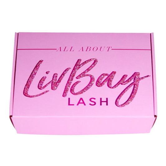 Pink mailer box with glittery Lash branding on the lid, closed
