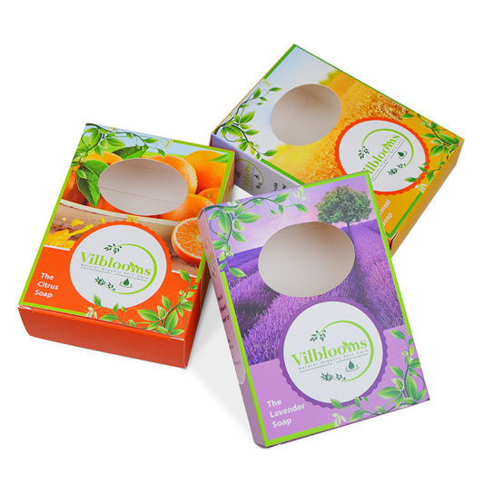 Set of colorful folding soap cartons with clear round window openings