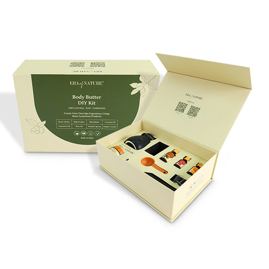 Green magnetic flap rigid gift box open, showing body butter DIY kit contents inside.