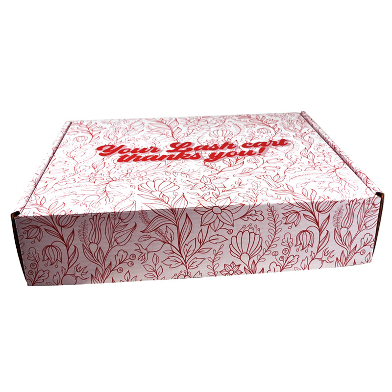 Mailer box with pink floral leaf pattern, flat top and dark-edged fold sides