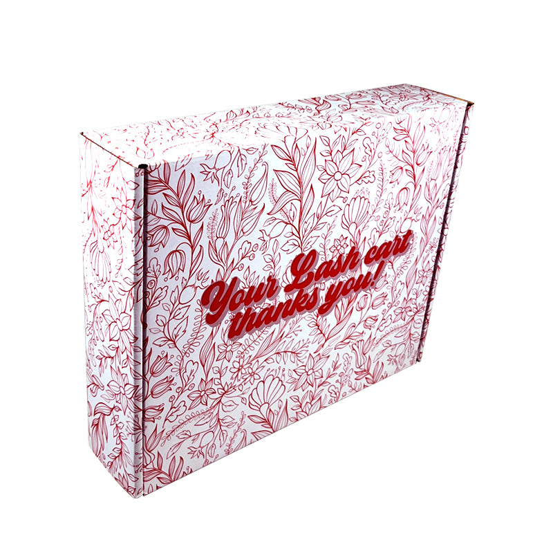 Mailer box with pink leaf pattern and "Thank you" message on side
