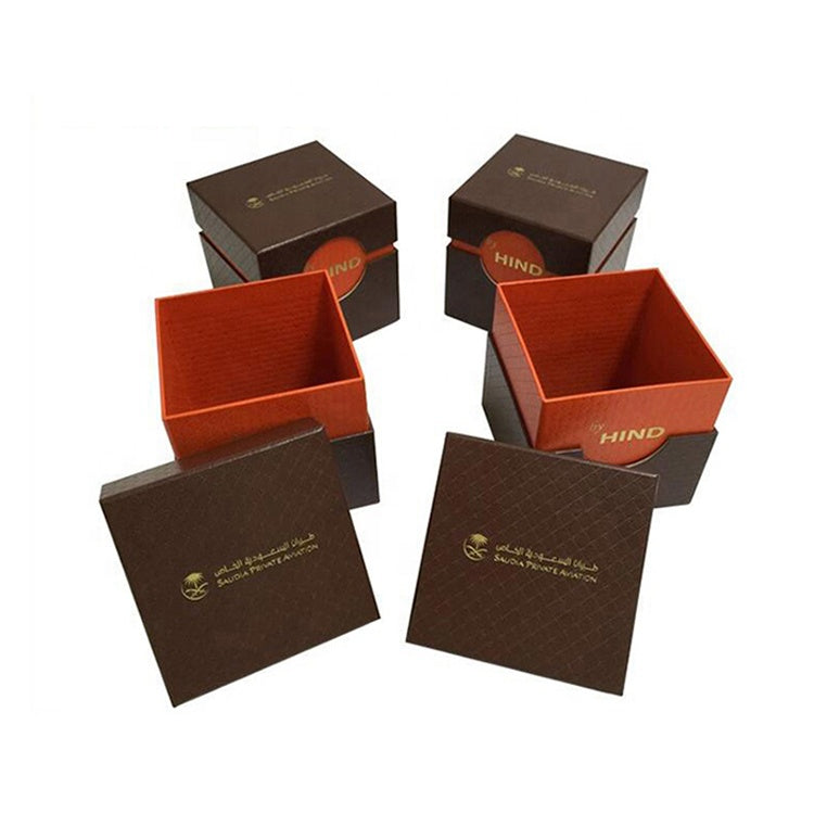 Gift watch boxes with hinged inner tray in brown and orange with printed labels