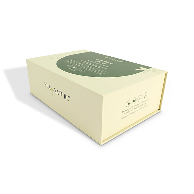 Light green rigid gift box with green label panel and leaf graphics on top.