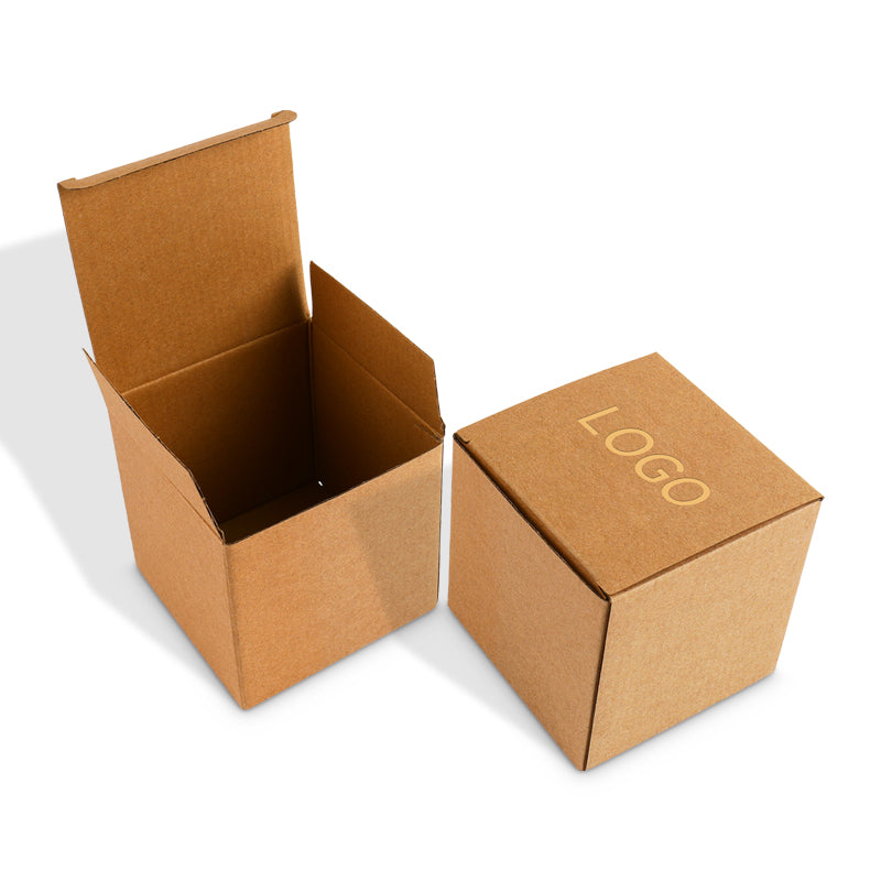Kraft corrugated shipping box with tuck top, open with logo on one lid