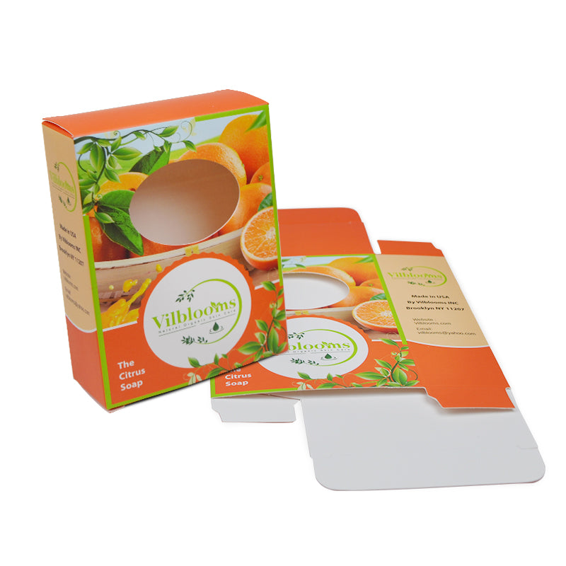 Orange citrus-themed folding soap carton with clear round window and insert