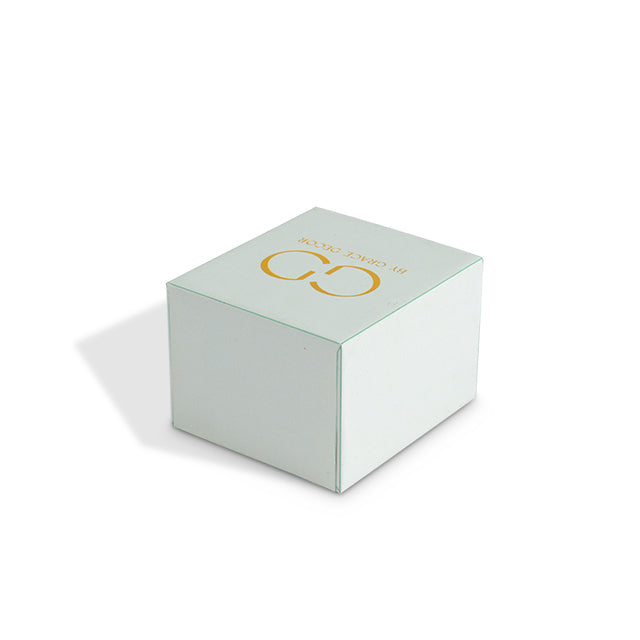 Top view of closed mint green drawer box with gold foil "GD" logo by Grace Decor
