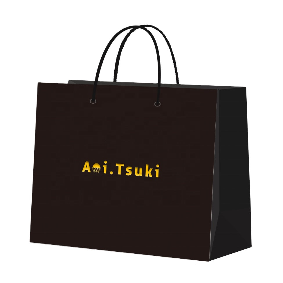 Dark brown kraft paper bag with custom yellow logo and braided rope handles