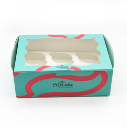 Bakery box with handle and window, cupcake-themed design, teal and pink