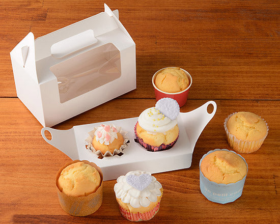 White gable bakery box with handle, holding cupcakes and pastries