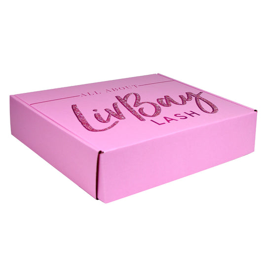 Pink flat mailer box with glittery 'Lash' logo on top and openable side flaps