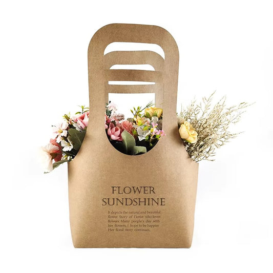 Front view of kraft flower bag with oval die-cut window showing roses and baby's breath