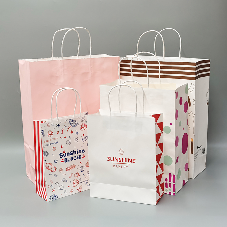 Assorted custom paper bags with various prints including stripes, polka dots, and burger themes