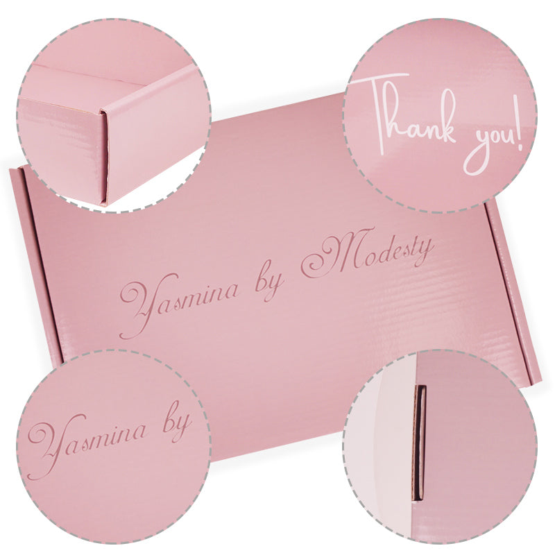 Detailed flat lay of pink custom box highlighting fold structure, logo, thank-you text, and magnetic closure