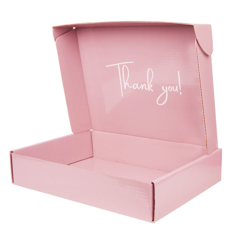 Open pink matte box with 90-degree lid showing white "Thank you!" interior print