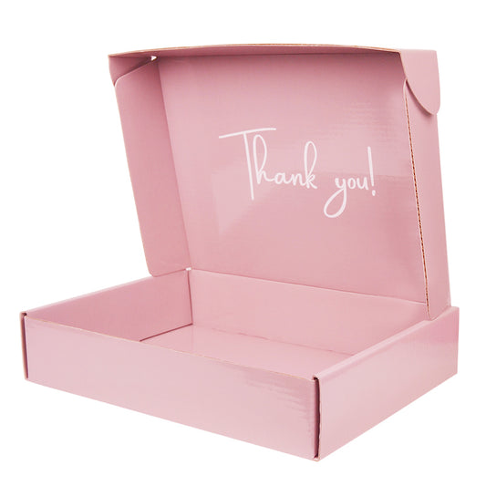 Pink matte gift box open, with 'Thank you!' printed on inner lid and flat base