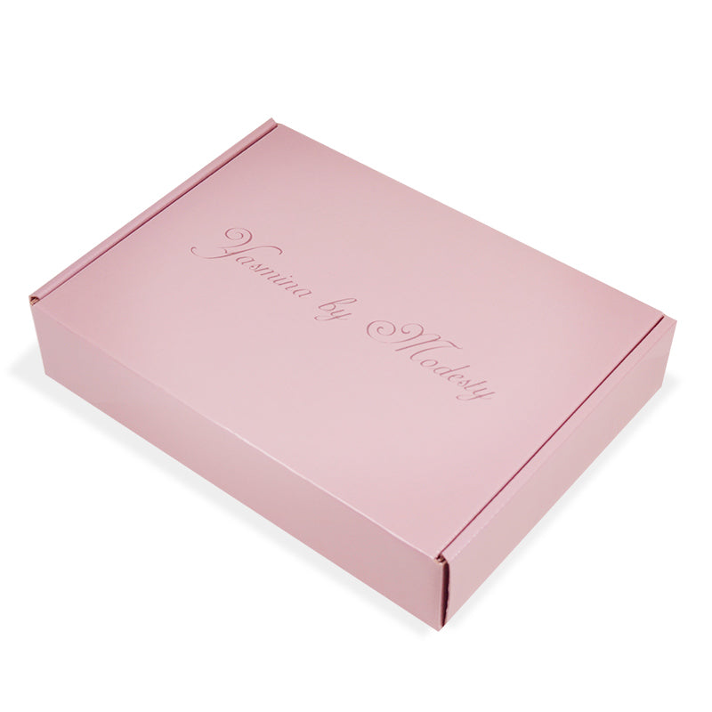 Closed custom pink luxury brand box with embossed  logo and matte finish