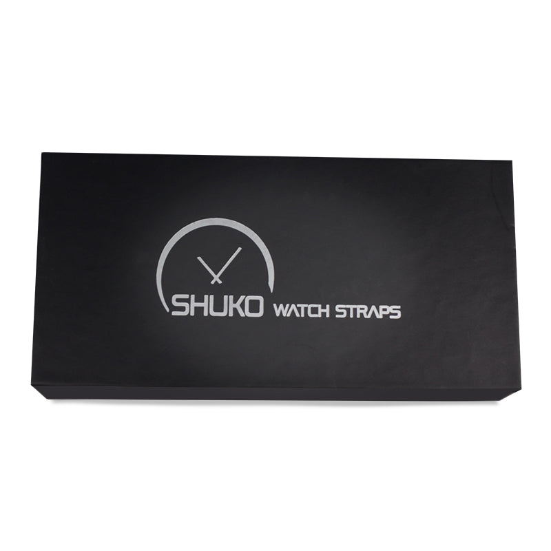 Front view of closed custom rigid drawer box for Shuko watch straps with silver logo