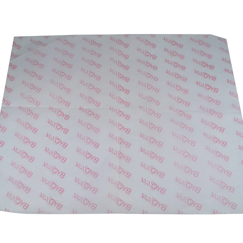 Flat sheet of custom tissue paper with repeated red "BAO" logo print