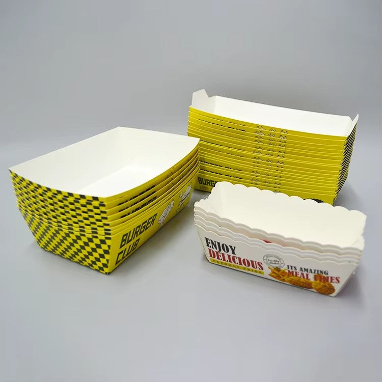 Stack of custom printed yellow food boat trays and white scalloped trays for bulk wholesale