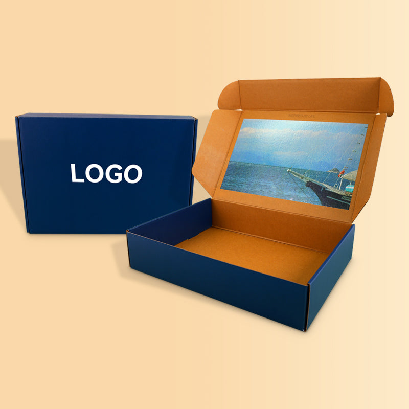 Navy blue custom printed mailer box closed with logo on top
