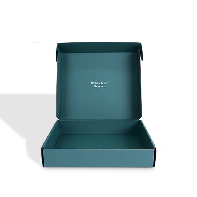 Open teal mailer box showing inside lid custom print message area