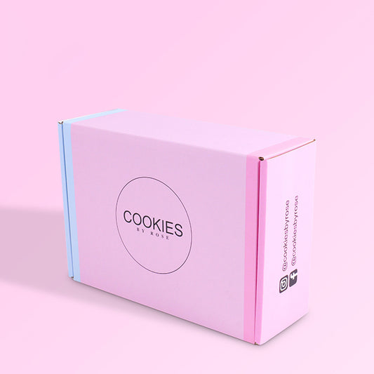 Corrugated mailer box with Cookies by Rose logo on pink, blue side panel