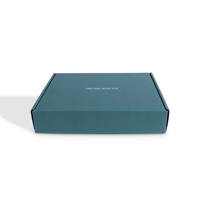 Side profile view of teal blue literature mailer box