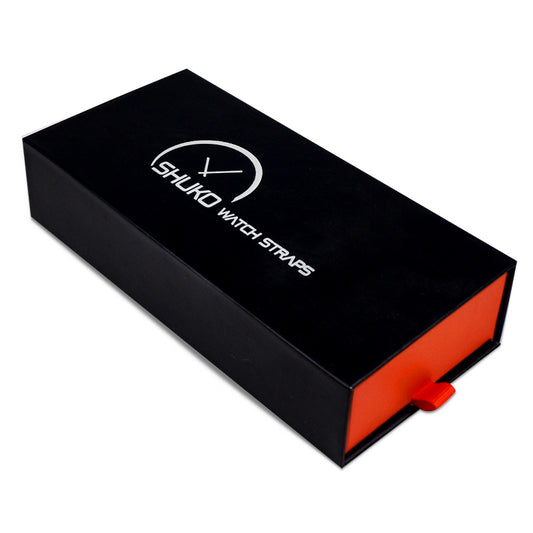 Closed slide lid rigid box with red side view and pull tab for luxury watch packaging
