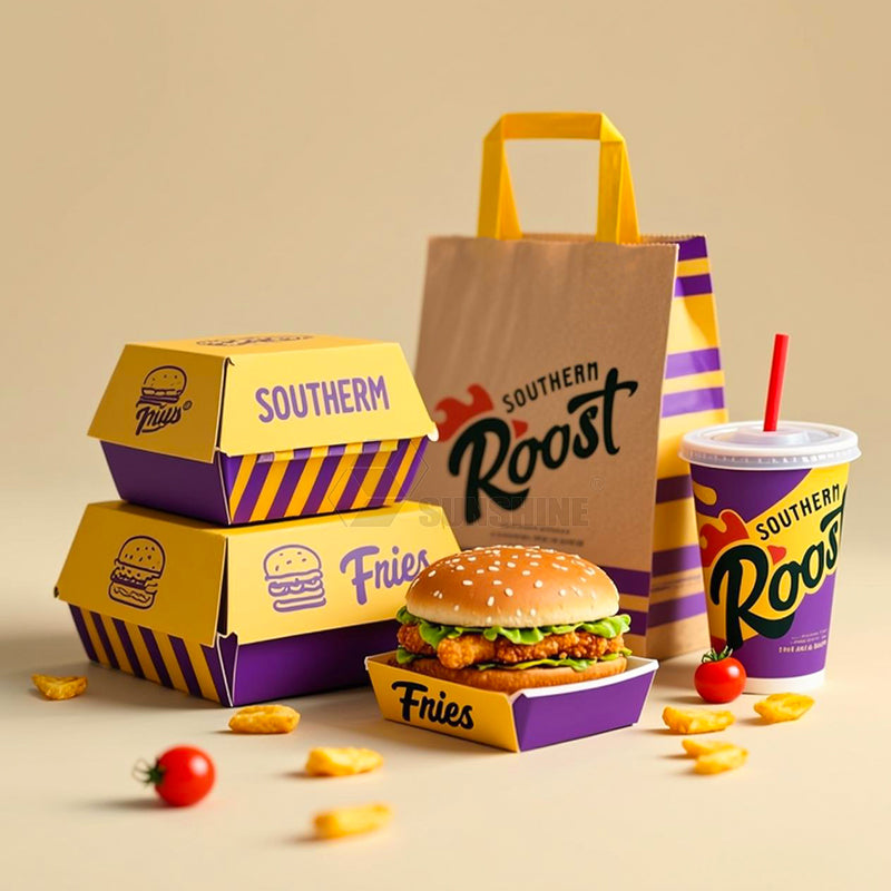 Fast food takeout packaging set with stacked burger boxes, fries cartons, paper bag, and drink cup
