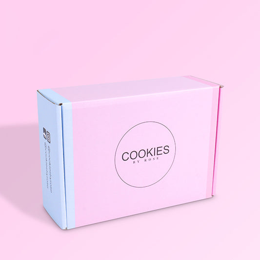 Corrugated mailer box, pink front with Cookies by Rose logo and blue side strip